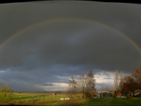 Panorama met de vorige foto's:  regenboog bij de Noorddijk (Boekhoute)